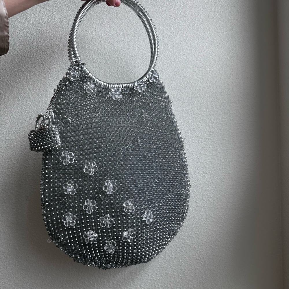 One of a kind silver plastic wired Bag